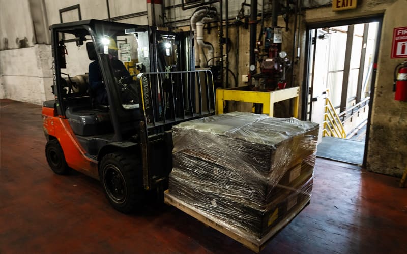 Pallet of used lead batteries being received at a recycler for sorting and inspection. Pallet of used lead batteries being received at a recycler for sorting and inspection.