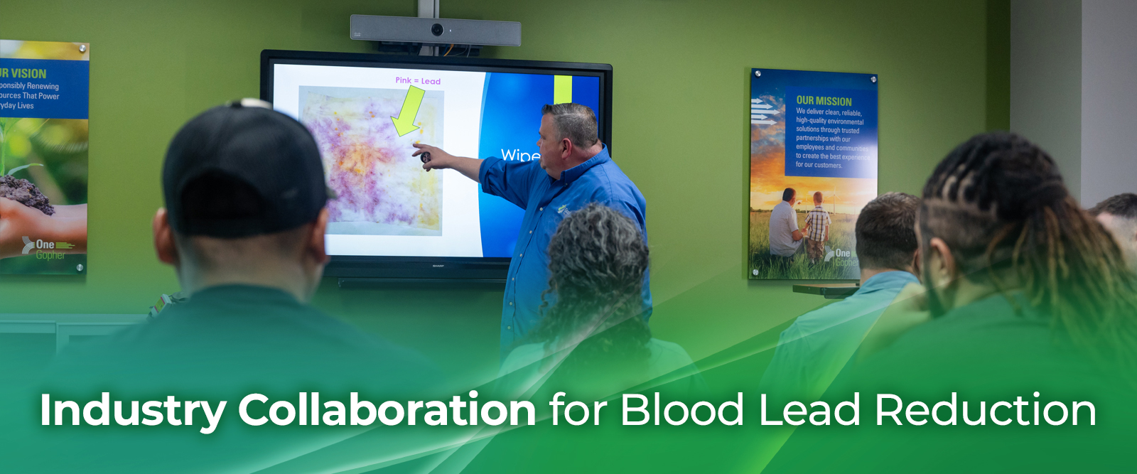 Workers at a lead battery recycling facility training on safety protocols designed to reduce lead exposure.